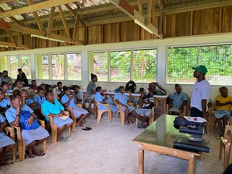Students at the Tulagi Community High School listening during the cybercrime awareness