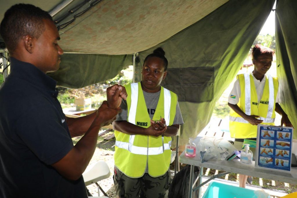 An officer undergoing handwashing training