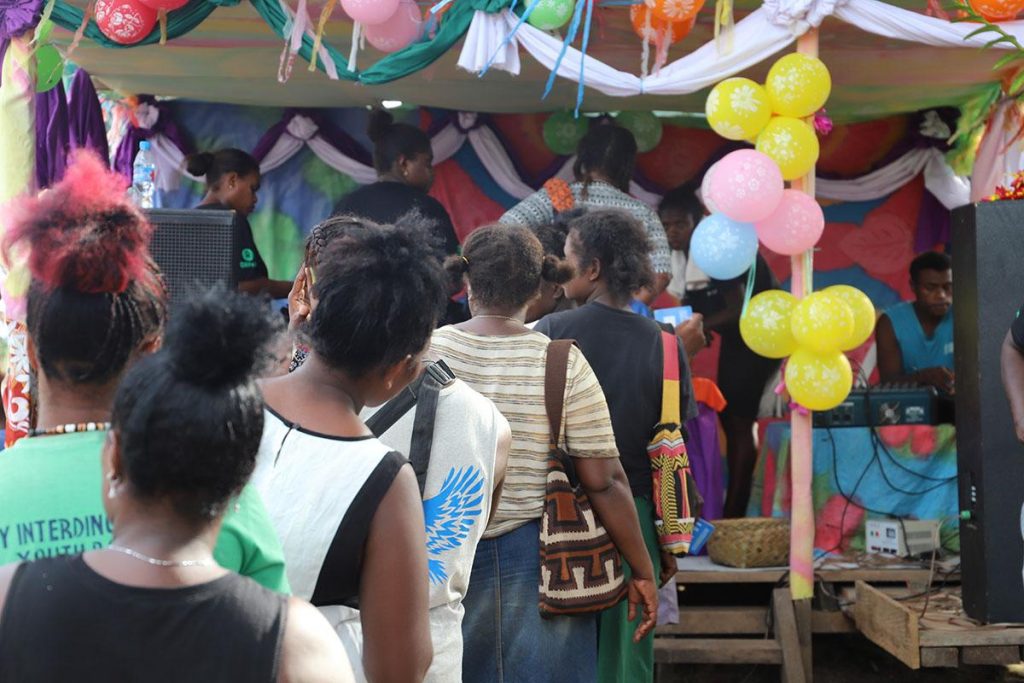 Kokona women splash out $100K from savings 1 Kokona community members queue for their first withdrawal. Over 43000 of withdrawals were made that day.