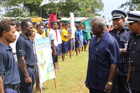 PM Sogavare inspects one of the uniform groups during the parade