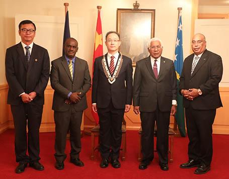 From L R A Chinese Official Foreign Minister Jeremiah Manele Ambassador Li Ming Sir David Vunagi and Permanent Secrestary Collin Beck