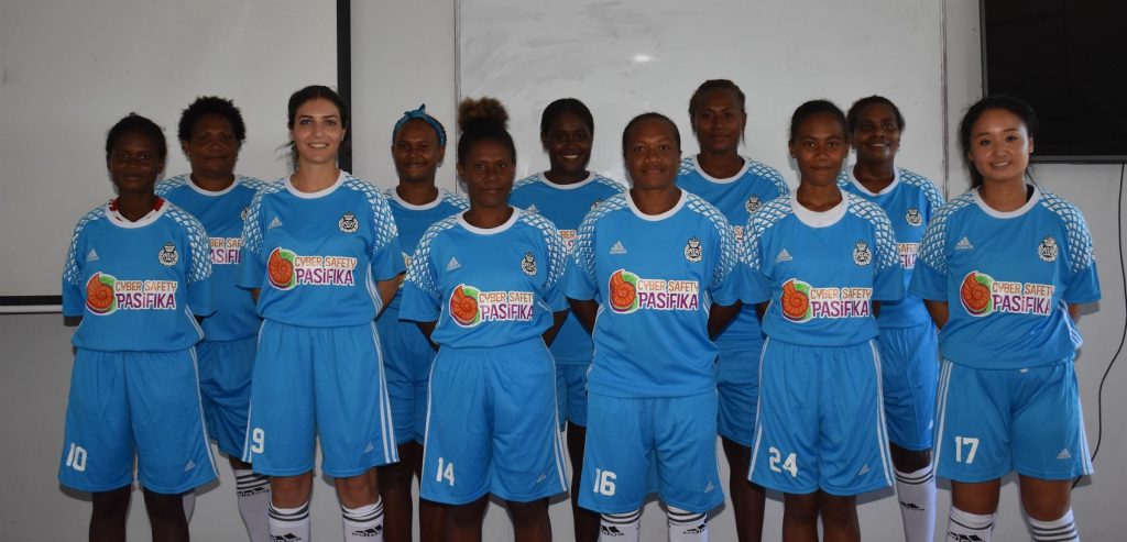 Members of the RSIPF womens soccer team in their new sky blue uniforms