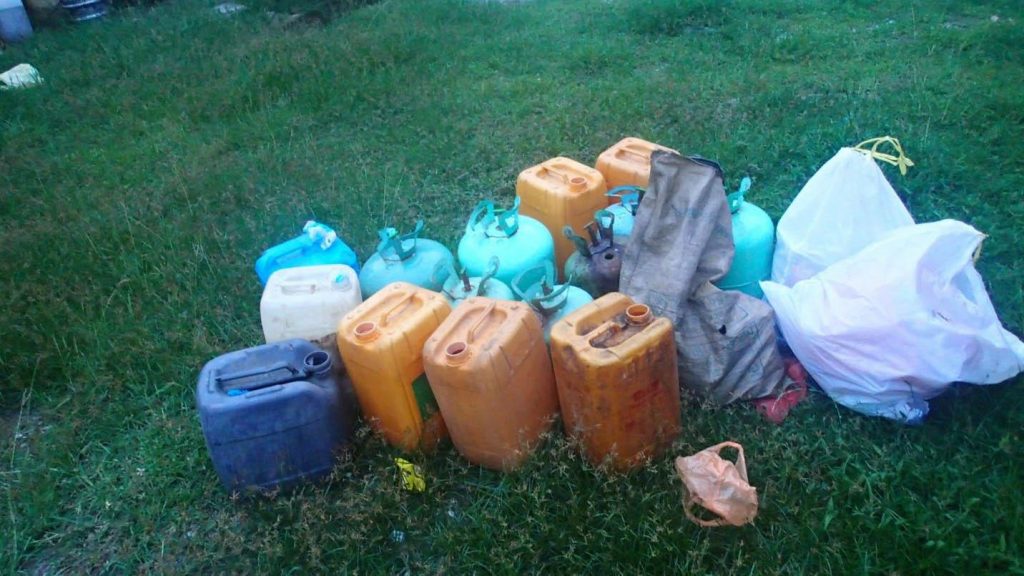 The containers of kwaso and gas cylinders confiscated during the raid