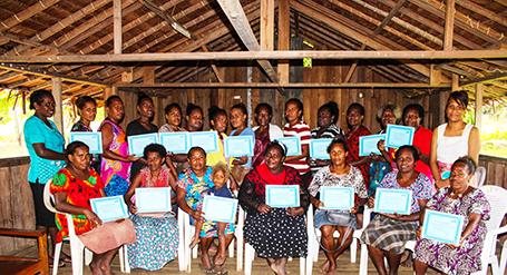 Women receiving their certicates from the GAP training