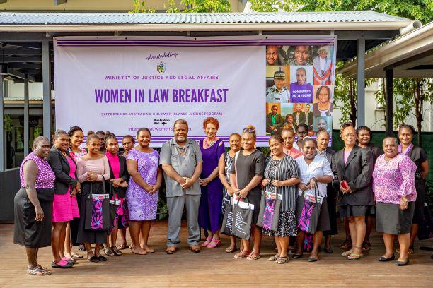 The MInister of Justice and Legal Affairs with some of his guests at the Women in Law Breakfast