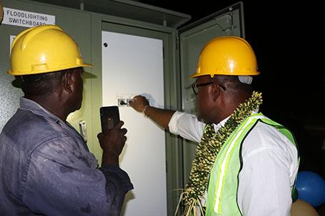 Deputy PM Hon. Maelanga switches on the LED lights.