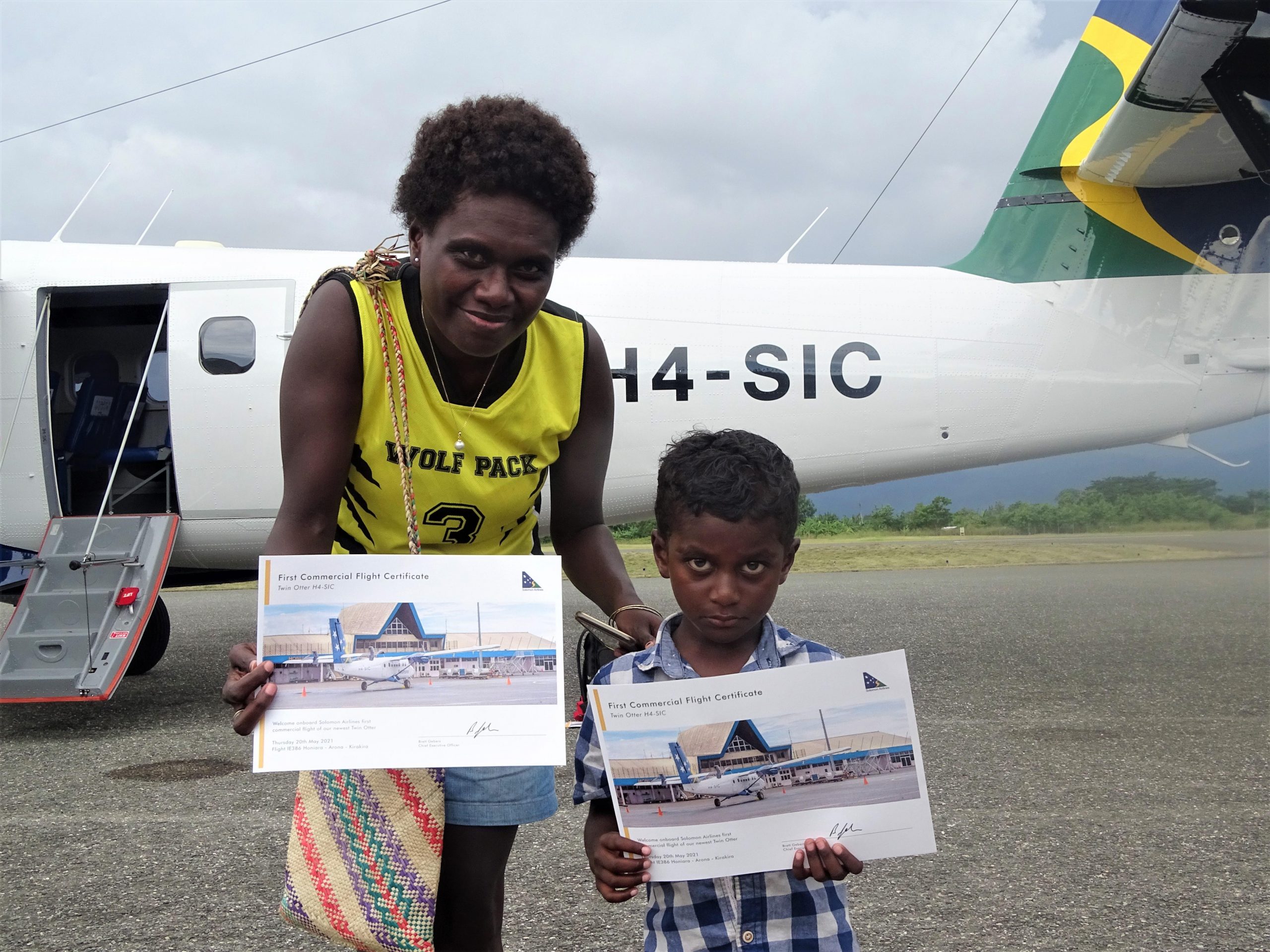 Solomon Airlines passengers receive first commercial flight certificate to mark IE386 - Honiara -Arona - Kirakira on 20 May 2021 at Honiara Airport