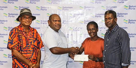 SIPA's Chief Financial Officer Mr.George Rausi hands over the Cheque to the competition's organising commitee.