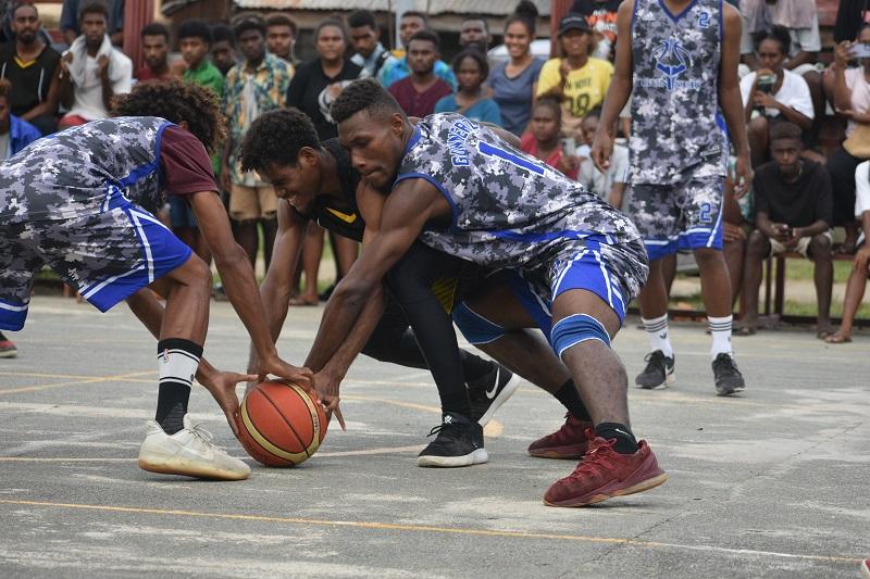 Two 71 Hassansins Player tussle with KGVI Sixers player