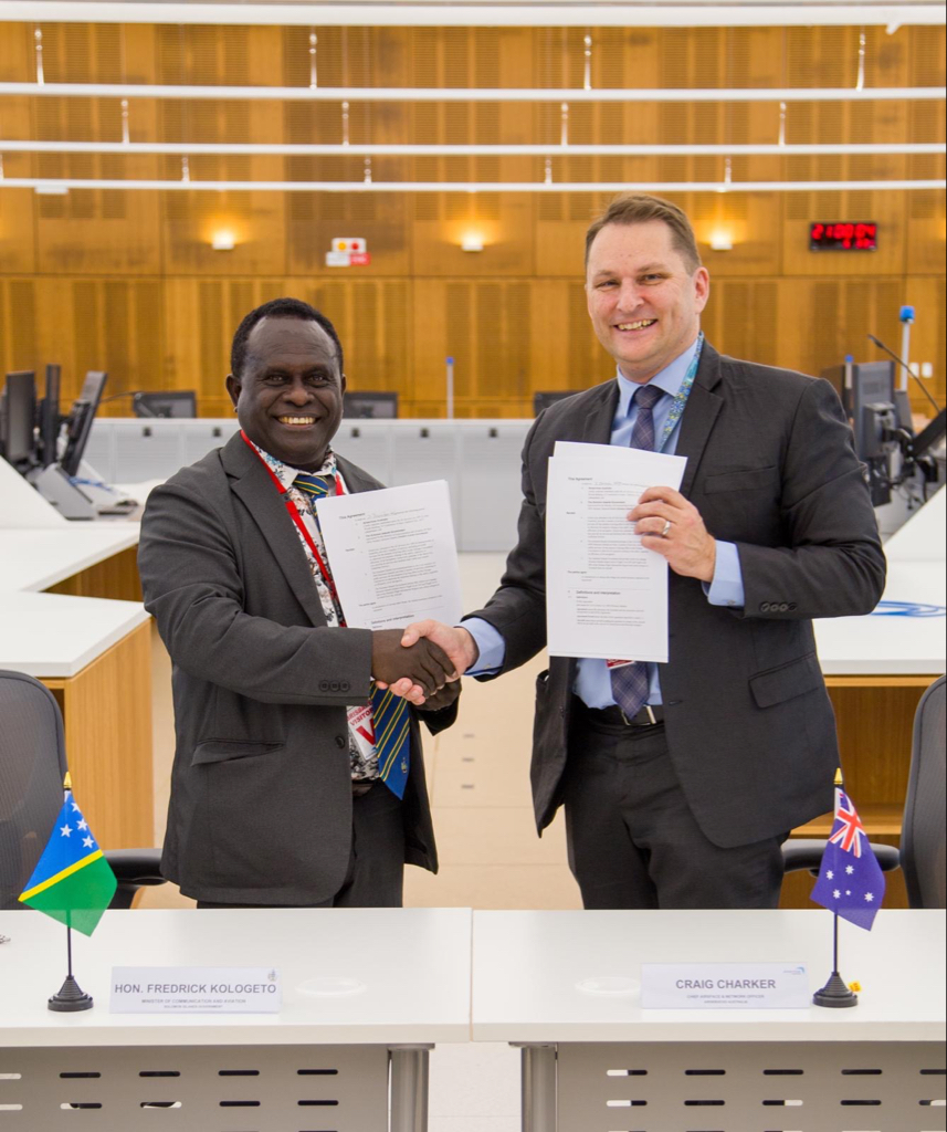 20 years of partnership continues Solomon Islands Minister for Aviation and Communication, Hon. Frederick Kologeto with Airservices Australia Acting Chi